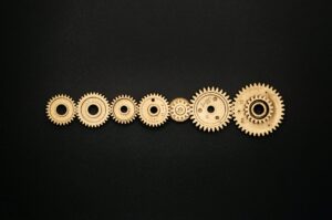 photo of golden cogwheel on black background